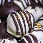 Oreo Cookie Balls are an easy bite-sized no-bake treat: crushed oreo cookies are mixed with cream cheese, and then these oreo balls are covered with chocolate. They are perfect dessert for holidays such as Christmas!