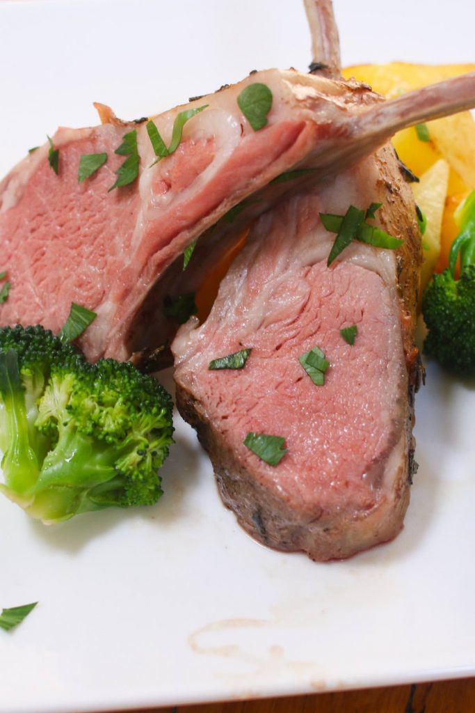 Sous Vide Rack of Lamb is a perfect and elegant holiday dinner recipe that’s mouth-watering delicious and foolproof. The rack of lamb is seasoned with garlic, rosemary, thyme, salt and freshly ground black pepper, and then cooked in the sous vide warm water bath to your desired doneness with the precise temperature!