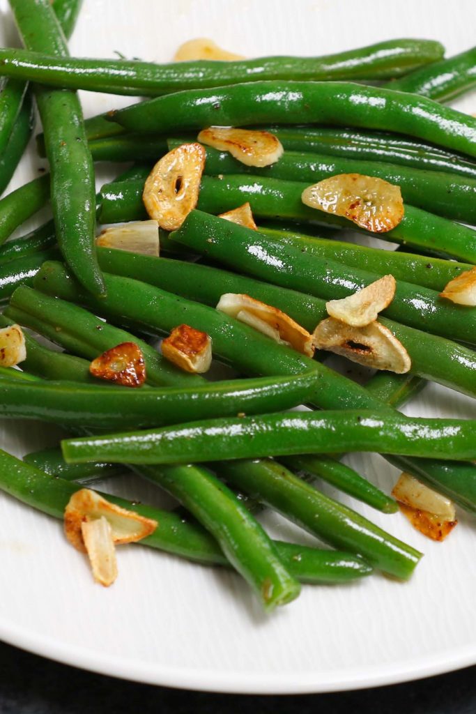 Sous Vide Green Beans with incredible flavor and perfect crispy texture! Made with just a few simple ingredients including garlic, this no-fail sous vide recipe makes a delicious side dish to any main meal. #SousVideGreenBeans #SousVideVegetables