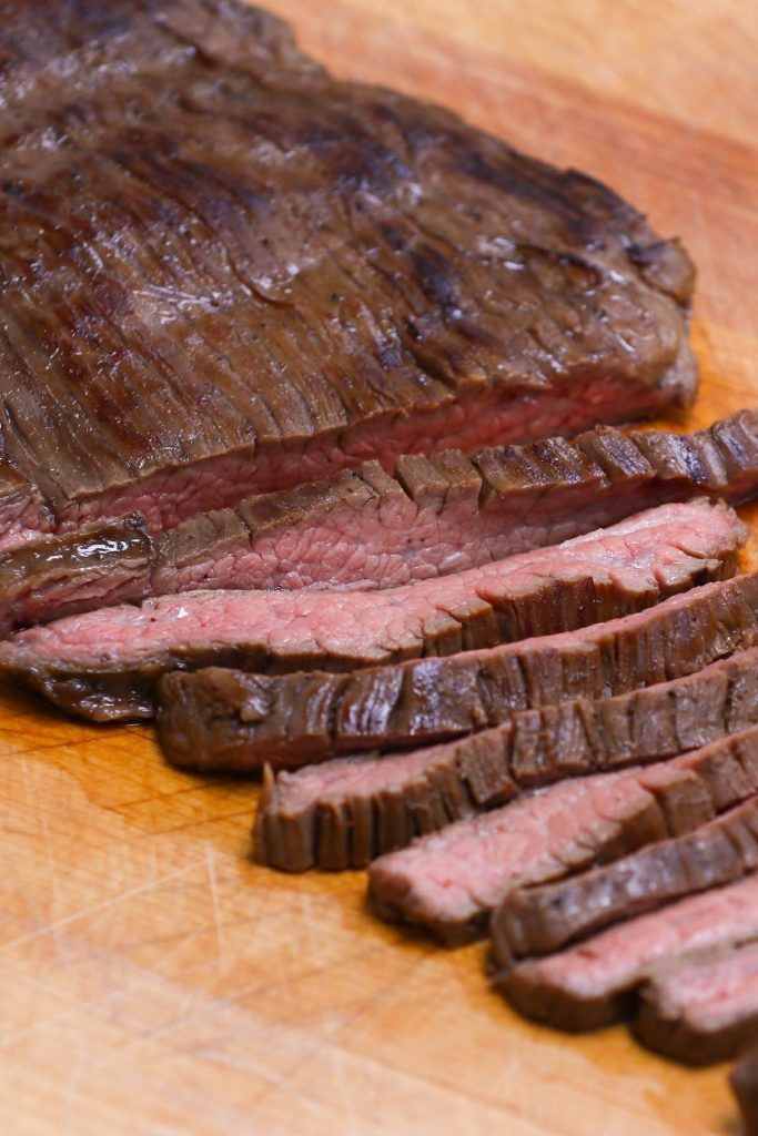This Balsamic Marinated Sous Vide Flank Steak is melt-in-your-mouth tender and juicy. The balsamic, honey, and soy sauce based marinade makes this cut extra flavorful, and the sous vide method allows you to cook it to perfection – turning this cheap cut better than your favorite steakhouse! #SousVideFlankSteak #SousVideSteak #SousVideSteakMarinade