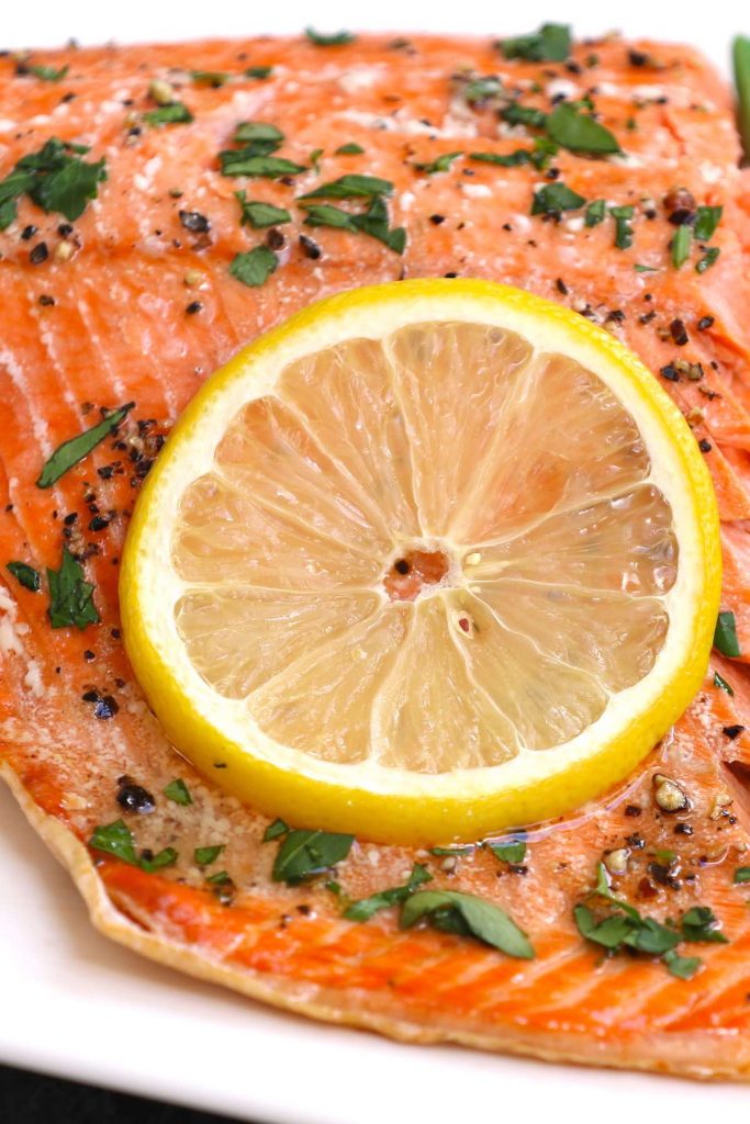 May I impress you with my perfectly tender Sous Vide Salmon? The salmon is cooked at the precise temperature you set, and it’s so moist with a flaky texture. This sous vide salmon recipe is healthy, flavorful, and easy to customize with your favorite seasonings. #SousVideSalmon