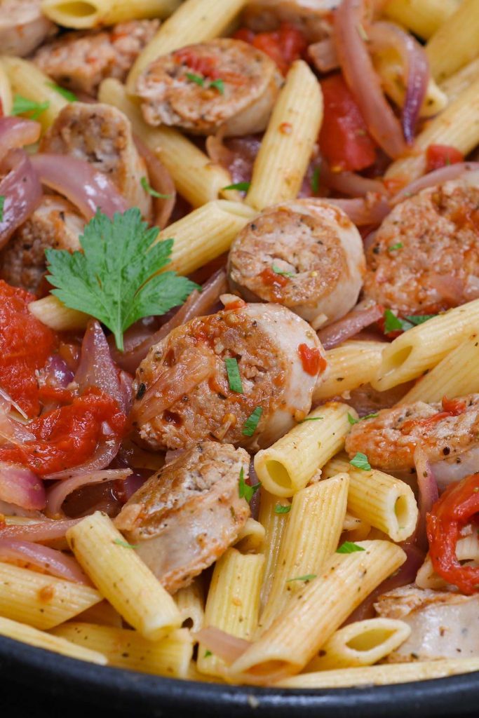 For the juicy texture and hearty flavor, nothing beats scrumptious Sous Vide Sausage. It’s cooked in a sous vide warm water bath at a precise temperature with minimal effort. The sausage is then cut into rounds and tossed with cooked pasta and vegetables in a delicious sauce. It’s a perfect weeknight dinner that tastes like it came from a restaurant! #SousVideSausage #SousVideItalianSausage #SousVidePorkSausage