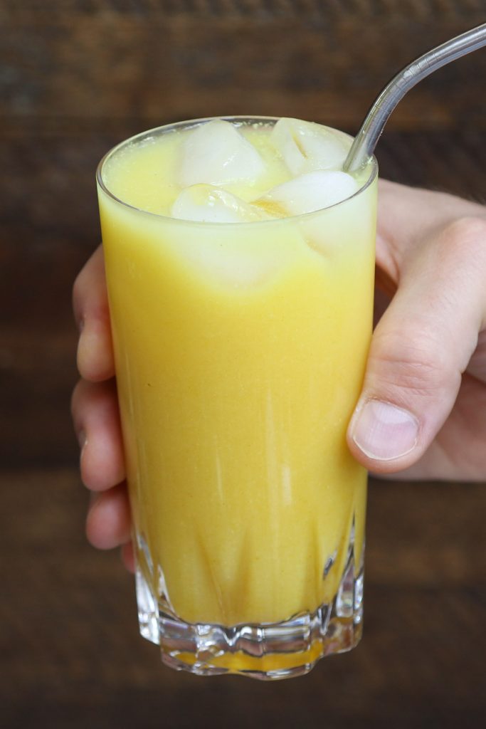 Make a delicious and beautiful Starbucks Iced Golden Ginger Drink at home! Keep this dairy-free beverage healthy by using the healthy ingredients and save money. This DIY copycat yellow ginger drink has the perfect blend of coconut milk, ginger, pineapple, and turmeric flavor. It’s an amazing refreshing fruity drink that takes less than 5 minutes to make. #IcedGoldenGingerDrinkStarbucks #GoldenGinger #StarbucksGoldenGingerDrink #StarbucksYellowDrink