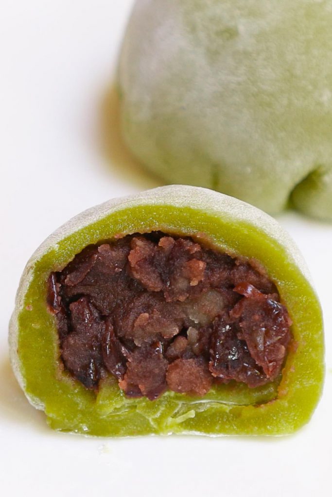 Homemade Green Tea Mochi is soft, chewy, and sweet with delicious matcha flavor and beautiful green color. This classic Japanese treat is really easy to make at home and better than that of your favorite restaurant! Plus you can customize the filling with red bean paste, strawberry, or ice cream. #GreenTeaMochi #MatchaMochi