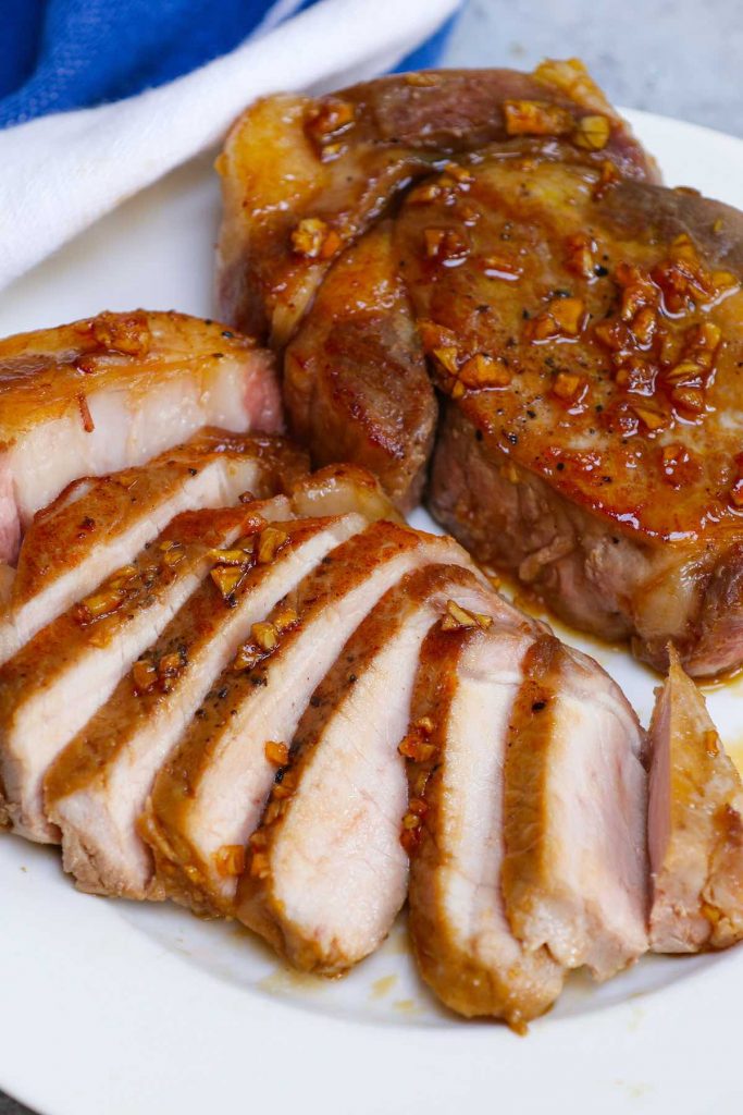 Say goodbye to tough and flavorless pork chops! These perfect Sous Vide Pork Chops are super tender, juicy, and full of flavor! The sous vide method cooks the bone-in or boneless pork chops to your targeted temperature precisely, and we’ll show you how to easily finish them with 5 different popular flavors! #SousVidePorkChops