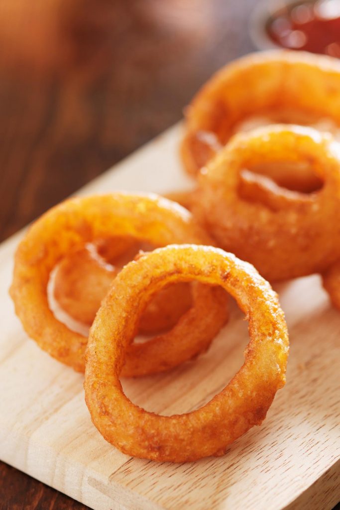 These copycat Burger King Onion Rings are crispy and bursting with savory onion flavors! Made with a few simple ingredients, these homemade onion rings are a perfect side dish, appetizer, or snack for any occasion. Pair them with the onion ring sauce – mouth-watering delicious!