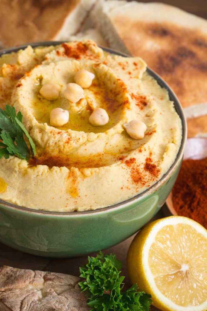 Hummus is a smooth, creamy, and flavorful savory spread made with puréed chickpeas. You can buy it from the grocery stores, order it at Middle Eastern/Mediterranean restaurants, or make it at home by stirring in tahini, lemon juice and spices.