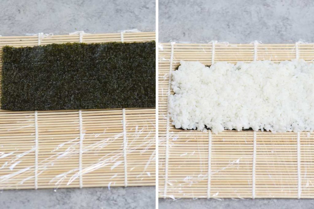 Dragon Roll recipe step 2: placing half of the nori sheet onto the bamboo mat and spread the rice on top.