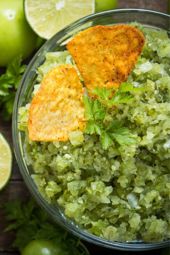 This traditional Mexican Green Tomato Salsa adds a bold splash of color to enchiladas and tacos, and makes a tasty dip for tortilla chips. While you can always pick up a ready-made jar, nothing beats the fresh taste of homemade salsa verde. Plus, there’s hardly a better way to use up that pile of green tomatoes.