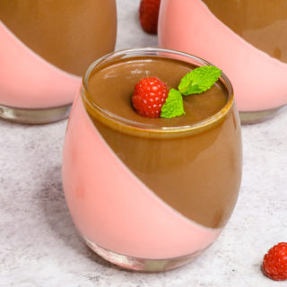 This Homemade Chocolate Pudding is a stunning make-ahead mouthwatering dessert that’s creamy and smooth. It’s an easy recipe with a few simple ingredients: raspberry jello powder, cool whip, half and half milk, gelatin, unsweet chocolate and sugar. Wow your guest with this refreshing dessert at your next party! No bake, and easy dessert. Video recipe. | izzycooking.com #ChocolatePudding