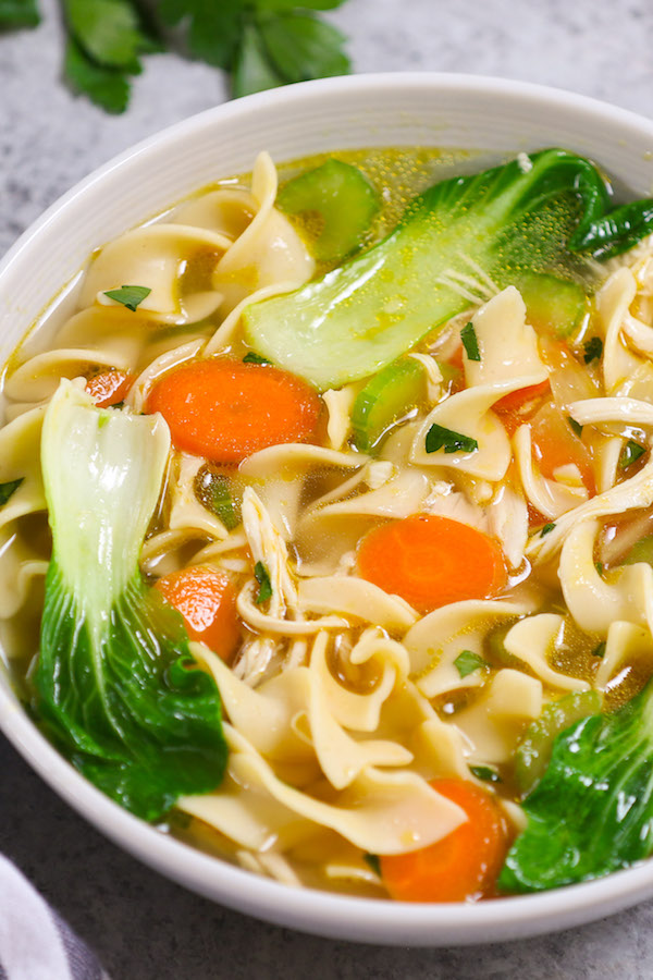 Delicious and comforting Instant Pot Chicken Noodle Soup - loaded with tender chicken, soft noodles and nutritious vegetables. Best of all, it takes only 30 minutes when made from scratch! #InstantPotChicken # ChickenNoodle Soup