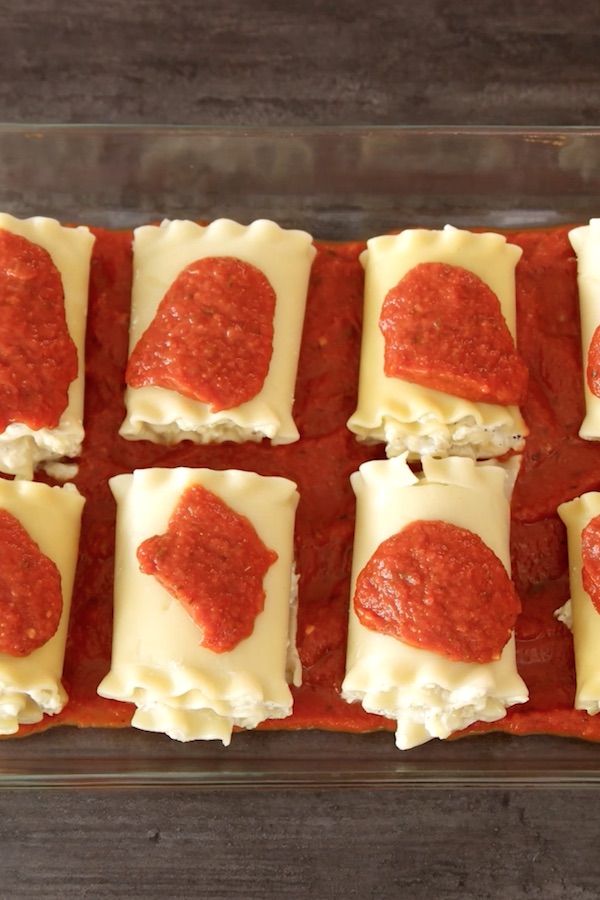 Add remaining marinara sauce evenly across tops of rolls