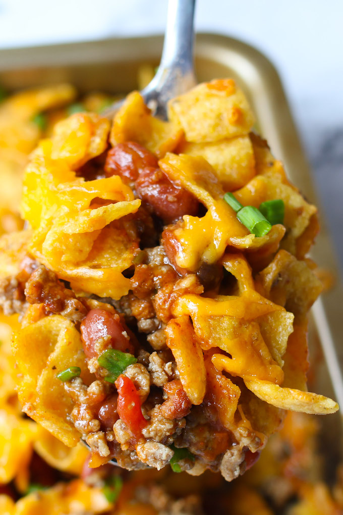 Frito Chili Pie is crunchy, beefy and cheesy and super easy to make! It’s a great Tex Mex meal that’s full of the best flavors!