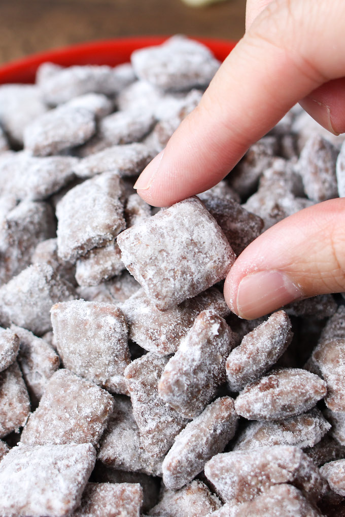 Puppy Chow is a simple and easy snack full of crunchy Chex cereal and packed with extra chocolate and peanut butter flavor!