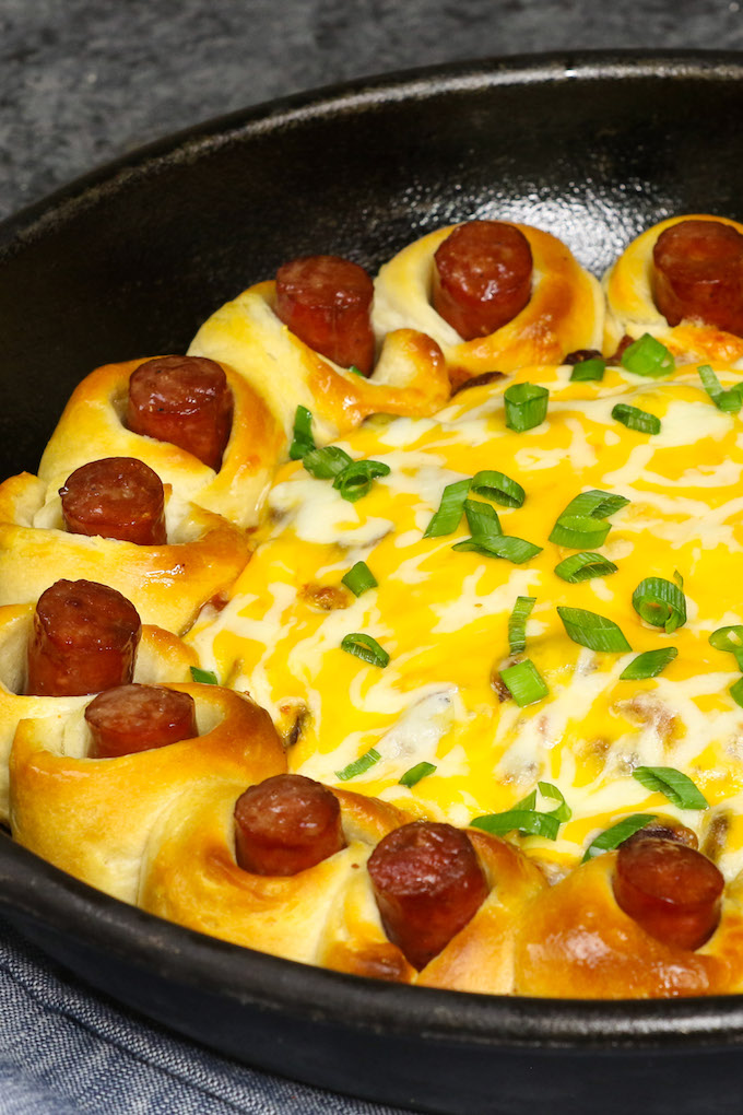 This hot dog chili casserole takes minimal effort to put together. It’s made with biscuit dough stuffed with hot dog, then baked to perfection in a chili sauce topped with cheese.