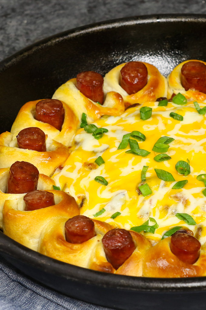 This hot dog chili casserole takes minimal effort to put together. It’s made with biscuit dough stuffed with hot dog, then baked to perfection in a chili sauce topped with cheese. 