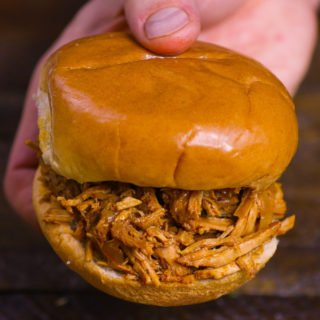 pulled pork sandwich made with the shredded pork shoulder crock pot