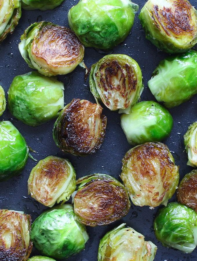 Honey Sriracha Brussels Sprouts are a sweet and spicy side dish that’s super easy to make and full of flavor. Roasting brussels sprouts in the oven at a high temperature and then drizzled with honey sriracha sauce ensures the vegetable stay tender and crispy.