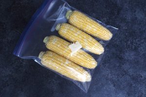 Place corn and butter in a large resealable bag in one layer.
