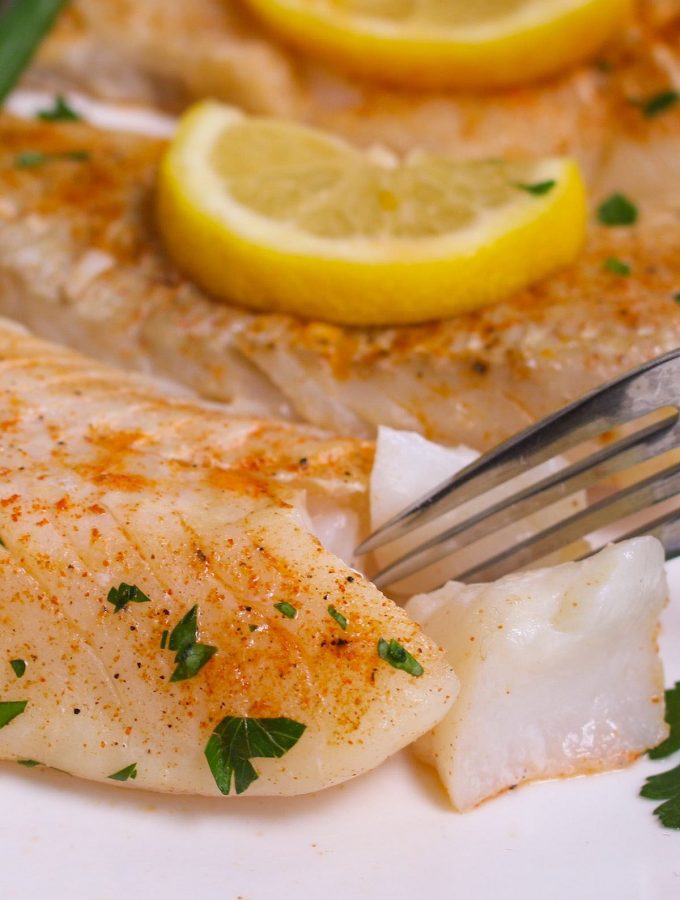 Lemon Garlic Sous Vide Cod – simple, perfect and delicious! The sous vide cooking technique takes the guess work out and allows you to cook a restaurant-quality fish dinner at home. The cod is precisely cooked to the temperature you set, with the perfect tender and flaky texture!
