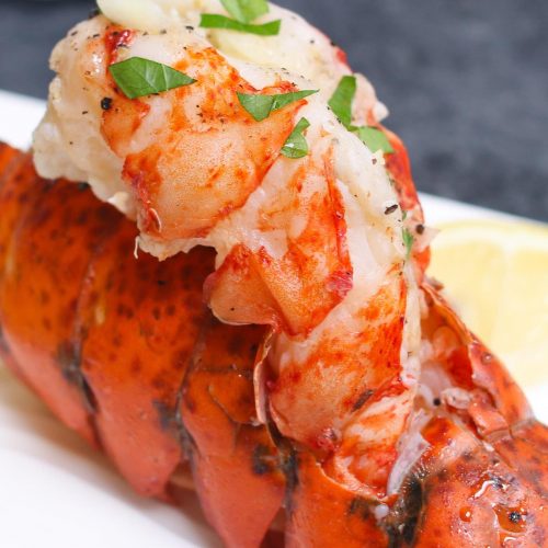 These Sous Vide Lobster Tails are incredibly tender, juicy, and full of delicious lemon butter flavor. With sous vide method, cooking lobster is no longer intimidating. This is a no-fail recipe that produces the most succulent restaurant-quality lobster at home! #SousVideLobster #SousVideLobsterTails
