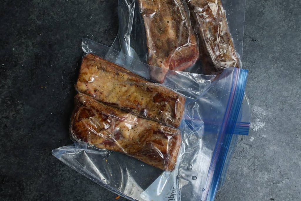 Vacuum-seal short ribs in zip-lock bags.