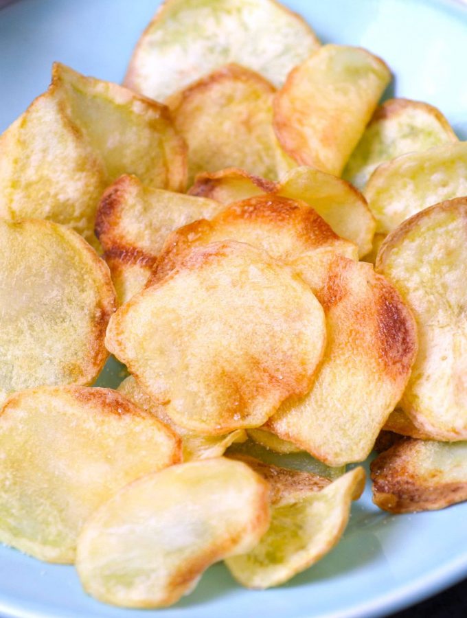 Crispy and healthy homemade Air Fryer Potato Chips made with only 3 ingredients. No oil needed! Season them up the way you like. This crunchy snack tastes so good and you’ll never buy store-bought potato chips again!