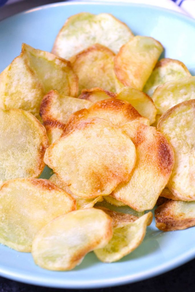 Crispy and healthy homemade Air Fryer Potato Chips made with only 3 ingredients. No oil needed! Season them up the way you like. This crunchy snack tastes so good and you’ll never buy store-bought potato chips again!