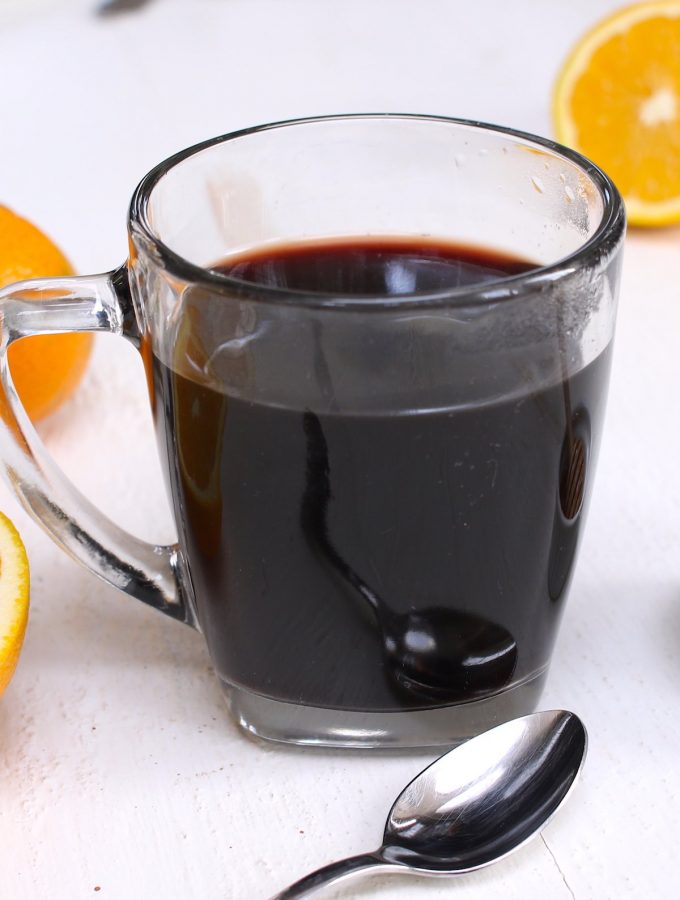 Elderberry Tea is a delicious and immune boosting tea that’s made with dried elderberries, cinnamon, ginger, and honey. This healthy tea can strengthen the immune system and fight off a cold. Here is a simple and easy recipe that shows how you can make this natural remedy tea at home! #ElderberryTea #ElderberryRecipe