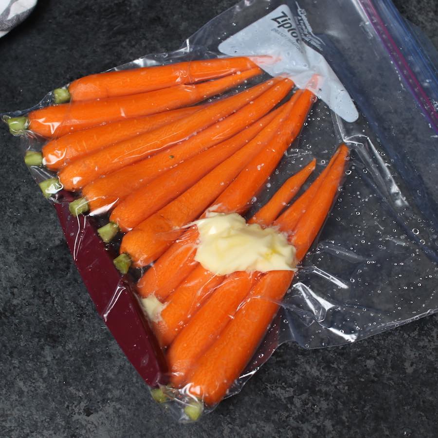 Vacuum-sealed carrots in a zip-loc bag.