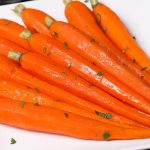 These Sous Vide Honey Glazed Carrots are tender and flavorful carrots simmered in a mixture of honey and butter, then topped with a sprinkling of parsley. The sous vide method transforms the carrots into the perfectly tender pieces. Sweet, savory and full of flavor, this recipe makes an amazing side dish for a holiday dinner or a week day meal.