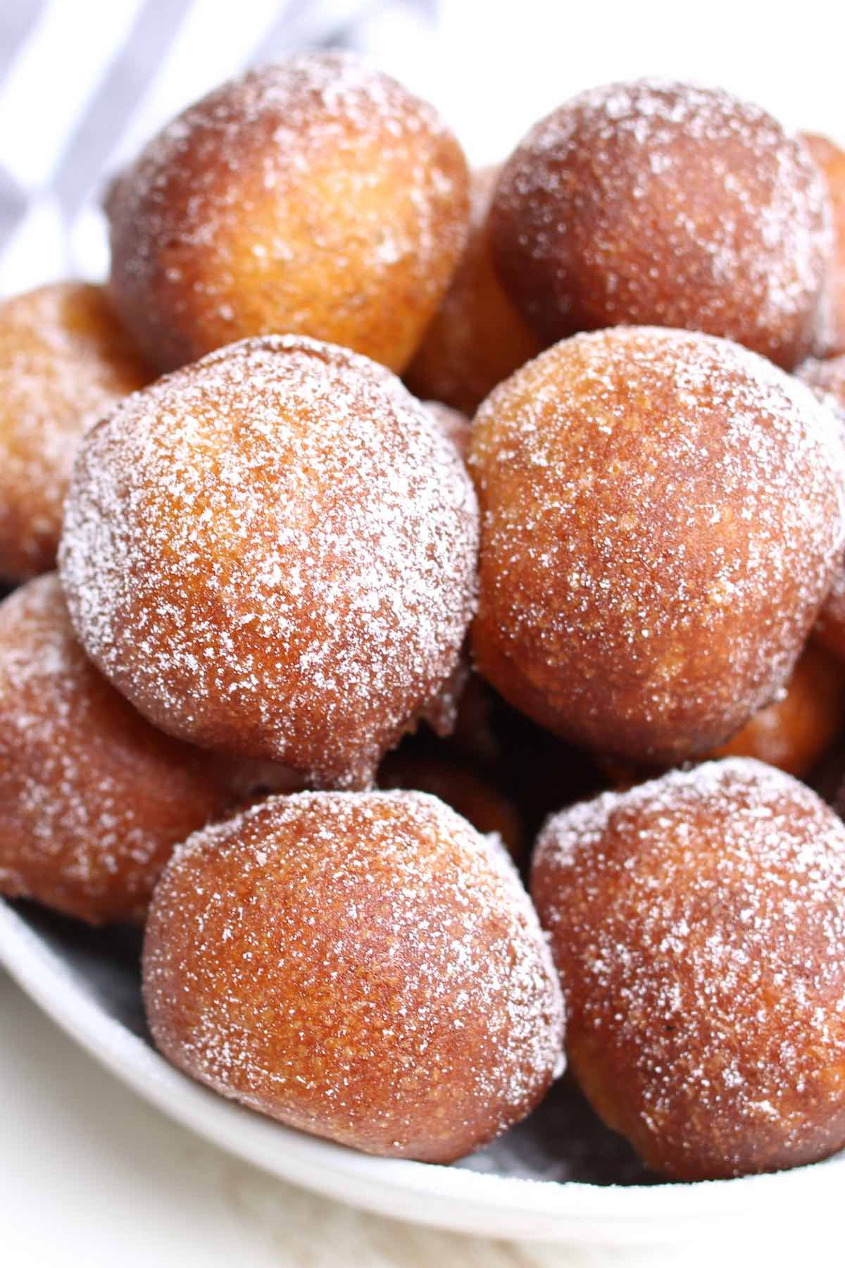 Grandma’s Zeppole Italian doughnuts are the easiest way to satisfy your donut cravings – light and fluffy on the inside and crispy on the onside. This zeppole recipe is so easy to make with a few simple ingredients. No finicky yeast required! #Zeppole #ItalianDoughnut