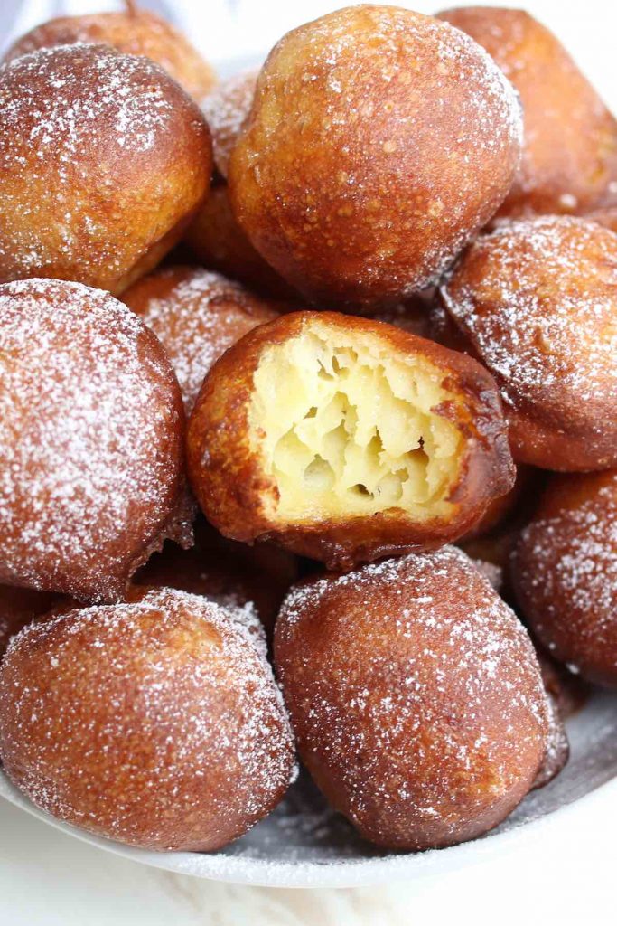 Cross sectional view showing the fluffy and light texture of the zeppole.
