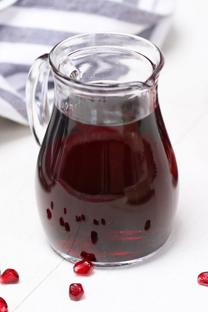 Learn all you need to know for how to make Grenadine Syrup for cocktails and drinks! With only 2 ingredients – pomegranate juice and regular sugar, this recipe shows you some easy tips to make this delicious sweet and tart non-alcoholic bar syrup, with a beautiful deep red color. #Grenadine #GrenadineSyrup #GrenadineRecipe