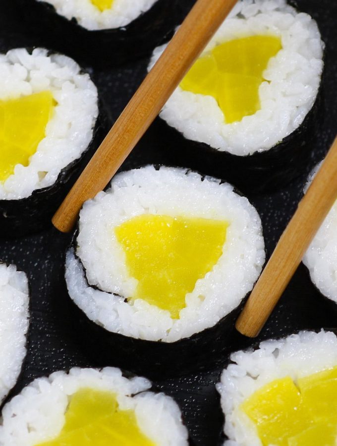 Oshinko is Japanese pickled vegetables packed with delicious flavors. My favorite is yellow radish (daikon) Oshinko – sweet, savory and refreshingly crunchy! They’re often rolled in sushi rice and seaweed sheet to make vegetarian Oshinko roll, or used as a side dish to accompany main dishes. #Oshinko #OshinkoRoll #OshinkoMaki #OshinkoSushiRoll