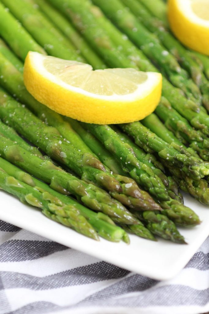 This easy and no-fail Sous Vide Asparagus is the perfect spring side dish recipe. Sous vide method brings out the best of asparagus with more concentrated flavor and the tender yet snappy texture. I’ll share with you the basic seasoning as well as some variation ideas: lemon butter, garlic parmesan, or fresh herbs and garlic. #SousVideAsparagus