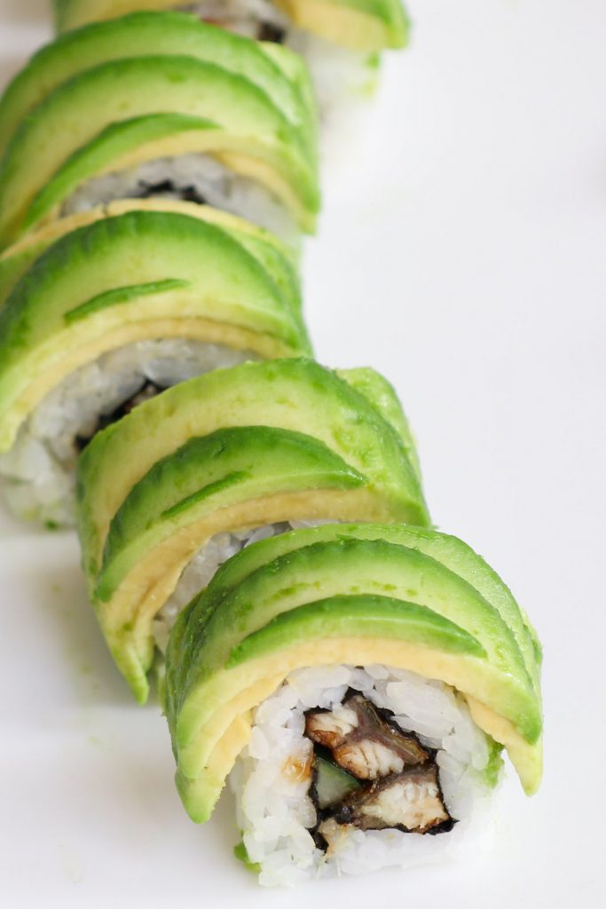 This Caterpillar Roll recipe is made with delicious unagi and crispy cucumber rolls in a seaweed sheet and sushi rice, topped with avocado. You can customize the roll with other delicious fillings. It's so easy to make and I'm going to share with you the secrets of how to make an avocado wrap! #CaterpillarRoll #CaterpillarSushiRoll #CaterpillarMakiRoll