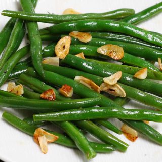 Sous Vide Green Beans with incredible flavor and perfect crispy texture! Made with just a few simple ingredients including garlic, this no-fail sous vide recipe makes a delicious side dish to any main meal.
