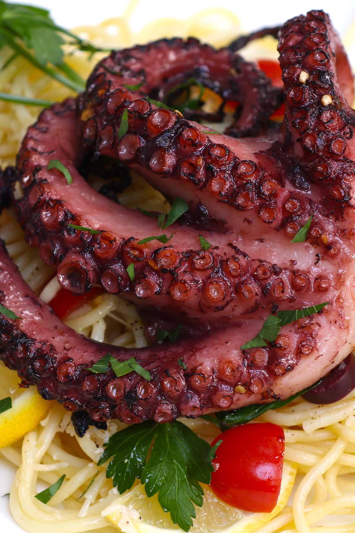 Sous Vide Octopus is the easiest and fail-proof method to cook the perfect octopus – tender and flavorful, with a beautiful char on the outside! Cook octopus in the sous vide water bath at 171ºF (77ºC) for 5 hours, and then quickly grill or sear at the end for the best octopus EVERY TIME! #SousVideOctopus