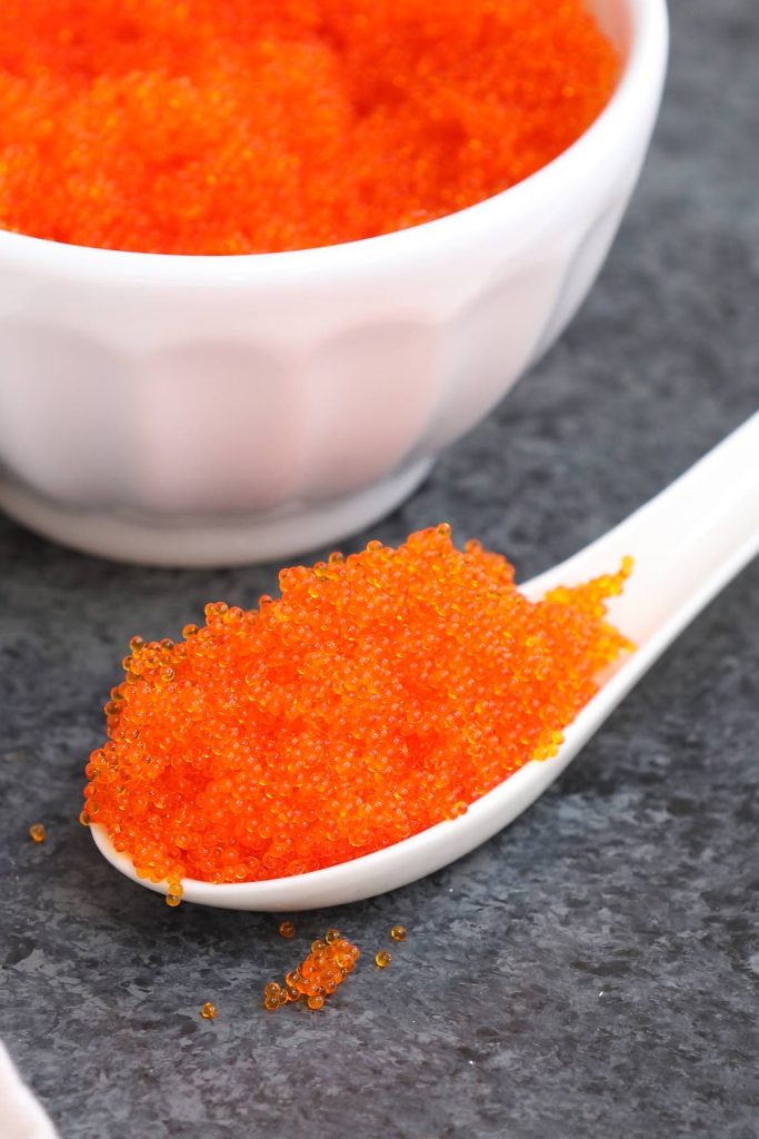 Tobiko is the Japanese word for flying fish roe, which is crunchy and salty with a hint of smoke. It’s a popular ingredient in Japanese cuisine as a garnish to sushi rolls. #tobiko #tobikoSushi