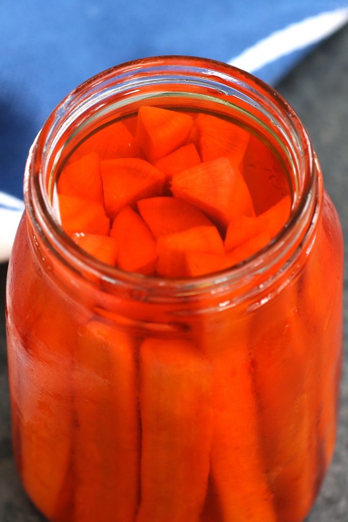 Yamagobo is Japanese pickled burdock root marinated in rice vinegar, sugar and salt mixture. It’s tangy, sweet, and refreshingly crunchy with a bright orange color. Homemade Yamagobo is incredibly easy to make, and great as an accompaniment to sushi rolls or rice meals. #Yamagobo #Gobo #PickledGobo #PickledBurdock #BurdockRoot