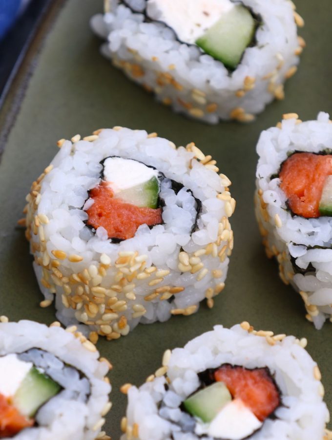 Philadelphia Rolls are filled with smoked salmon, cream cheese and cucumber, then rolled in nori seaweed sheet and sushi rice. In this recipe, you will learn how to make sushi rice, how to roll the the sushi, and how to make the delicious and creamy Philly roll. #PhiladelphiaRoll #PhillyRoll #SmokedSalmonSushi #PhillyRollSushi