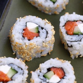 Philadelphia Rolls are filled with smoked salmon, cream cheese and cucumber, then rolled in nori seaweed sheet and sushi rice. In this recipe, you will learn how to make sushi rice, how to roll the sushi, and how to make the delicious and creamy Philly roll. #PhiladelphiaRoll #PhillyRoll #SmokedSalmonSushi #PhillyRollSushi