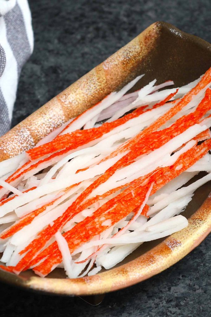 Shredded kanikama in a Japanese bowl.