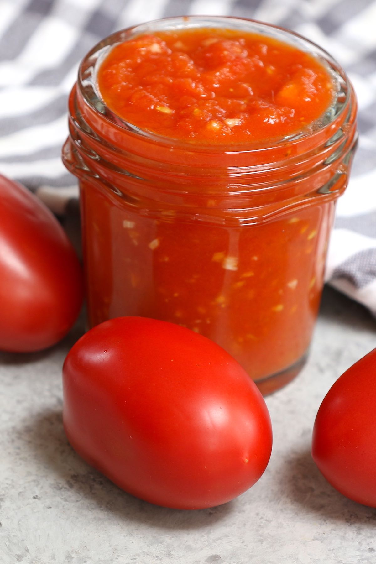 Plum tomatoes are colorful, egg-shaped tomatoes that are great for making thick tomato sauce and tomato paste due to its relatively low water content. So what are they exactly? How to use them? What are the sizes? How to make tomato sauce? Let’s find out everything about plum tomato in this post! #PlumTomatoes