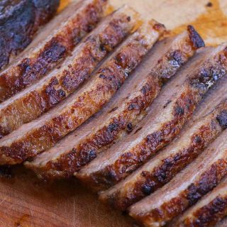 Sous Vide Brisket is cooked low and slow in a warm water bath until perfectly tender and juicy. It’s a process for melt in your mouth beef brisket with an addictive barbecue sauce. Both smokeless and smoked methods are included.
