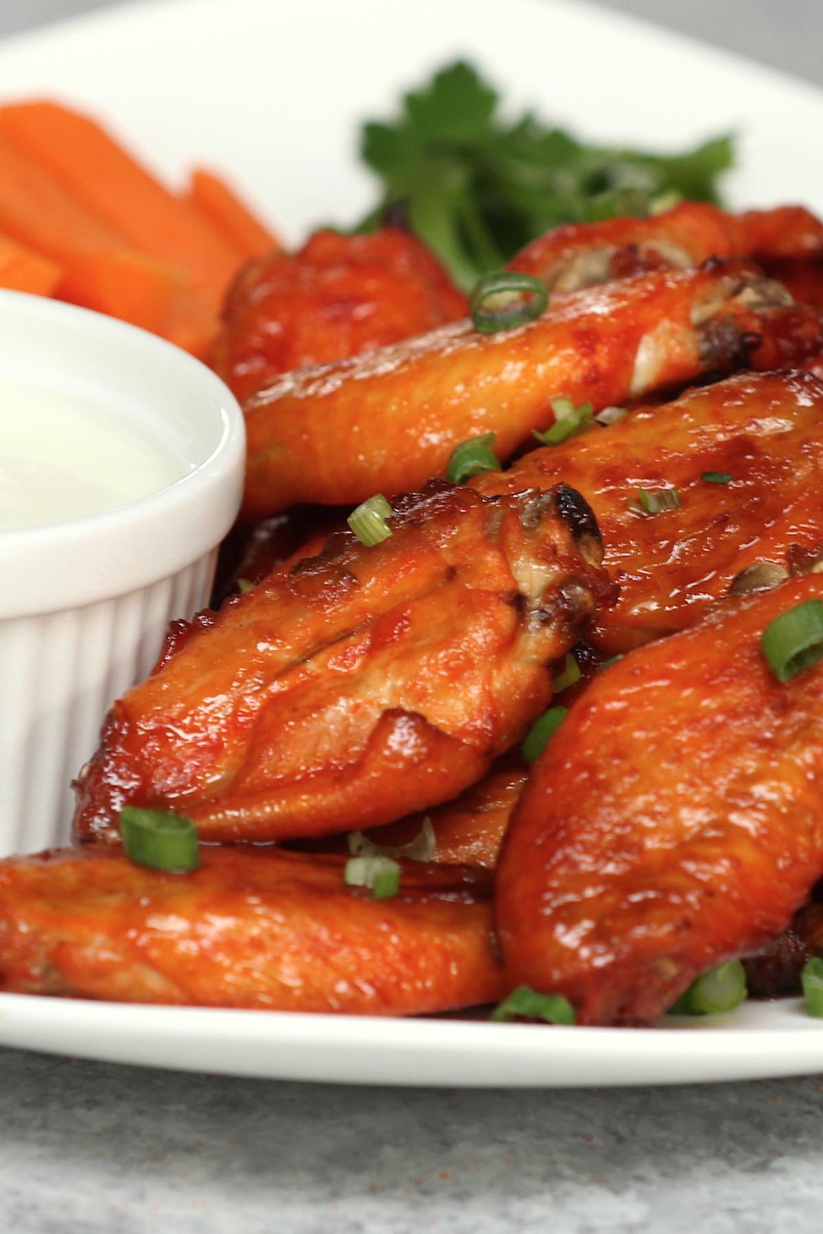 You’ll be amazed at just how perfect Sous Vide Chicken Wings are! It eliminates the mess and oil of deep fried chicken wings while creating the delicious game day snack! Cooking them sous vide means these Buffalo chicken wings come out perfectly tender, juicy, and are loaded with flavor. #SousVideChickenWings