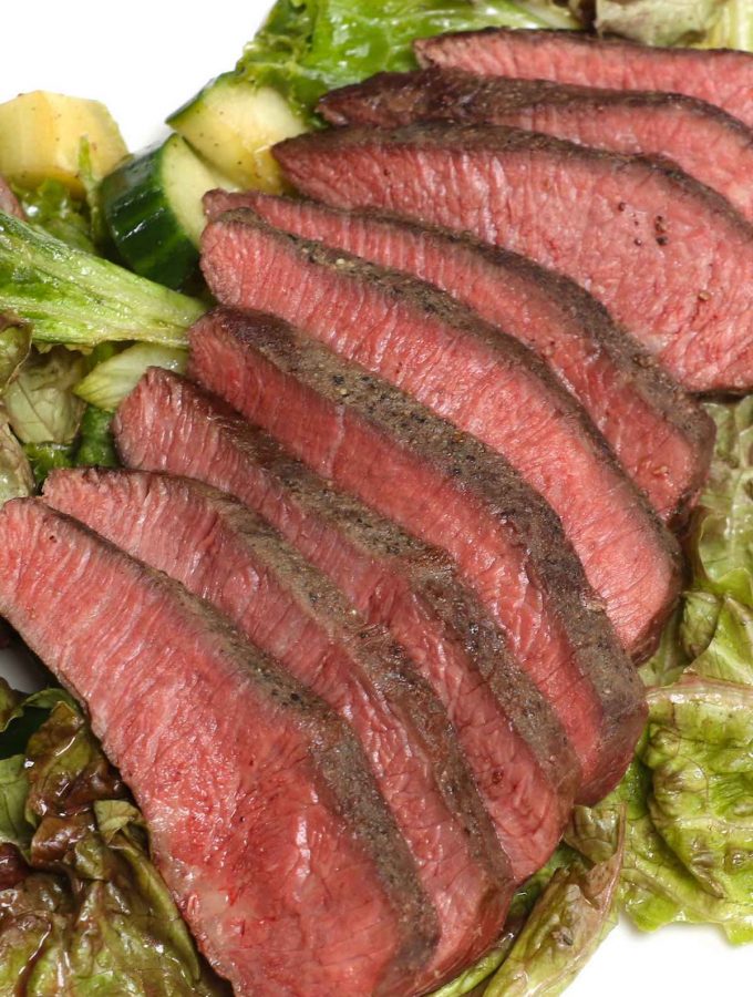 Sous Vide Flat Iron Steak is an easy and foolproof recipe to cook this affordable cut, delivering intense beef flavor with very tender texture. Cooking it at a precise temperature in the sous vide water bath and finishing with a quick pan sear produce the best result. #SousVideFlatIronSteak #SousVideFlatIron