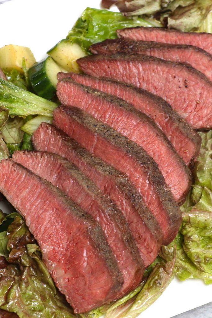 Sous Vide Flat Iron Steak is an easy and foolproof recipe to cook this affordable cut, delivering intense beef flavor with very tender texture. Cooking it at a precise temperature in the sous vide water bath and finishing with a quick pan sear produce the best result. #SousVideFlatIronSteak #SousVideFlatIron