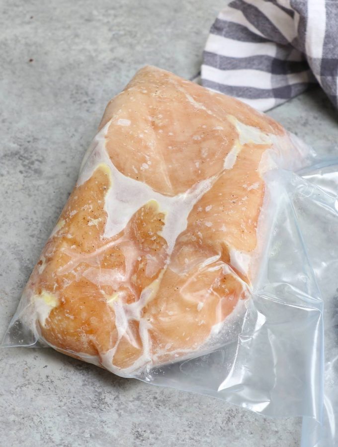Sous Vide Frozen Chicken Breast is one of the best features of a sous vide machine. It’s easy, convenient, healthy and turn out so well EVERY TIME! I never take the time to thaw chicken again after I discovered this method. #SousVideChickenBreast #SousVideFrozenChickenBreast